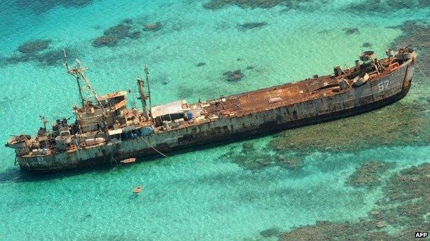 In this photo taken on 29 March 2014, an aerial view shows a Philippine navy vessel that has been grounded since 1999 to assert the nation's sovereignty over the Second Thomas Shoal, a remote South China Sea reef also claimed by China