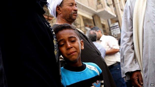 Egyptians mourn after a judge sentenced hundreds of Muslim Brotherhood supporters to death at a mass trial in Minya, Egypt - April 28, 2014.