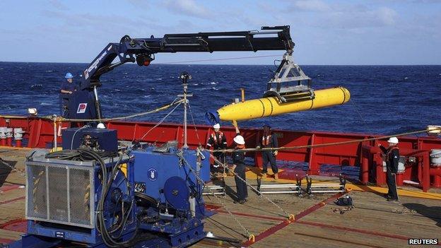 The Bluefin 21, the Artemis autonomous underwater vehicle, is hoisted back on board the Australian Defence Vessel Ocean Shield after a successful buoyancy test in the southern Indian Ocean as part of the continuing search for the missing Malaysian Airlines flight MH370 in this picture released by the U.S. Navy on 4 April, 2014