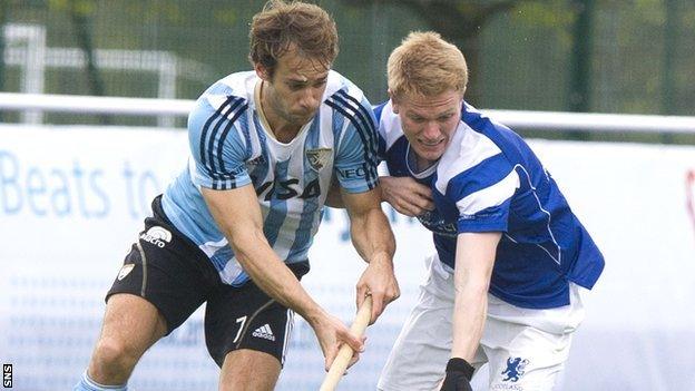 Scotland's Ian Moodie (right) battles with Facundo Callioni of Argentina