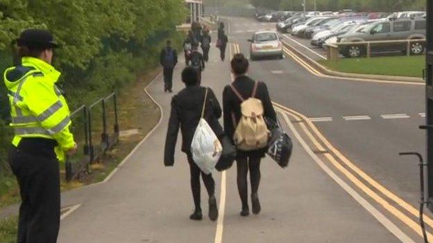 Pupils arriving at Corpus Christi Catholic College