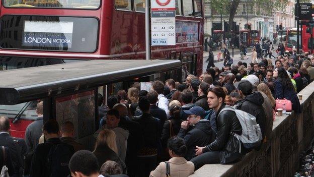 Crowds wait for buses outside Victoria station