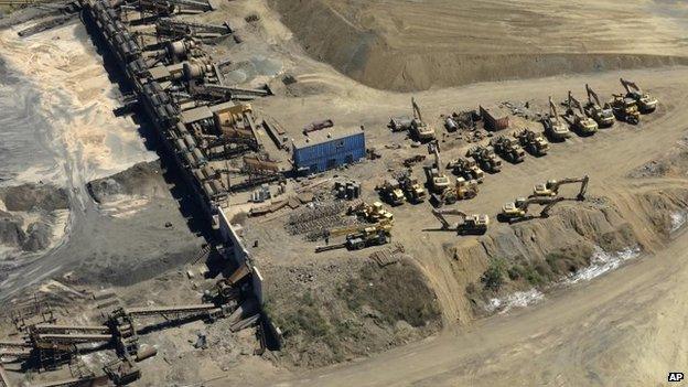 This photo shows a confiscated iron ore mining operation near the Pacific port of Lazaro Cardenas, Mexico (12 March 2014)