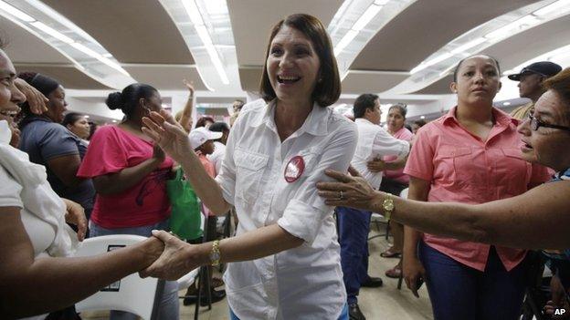 Marta Linares, the wife of Panama"s President Ricardo Martinelli, vice president candidate for the Democratic Change Party, greets women as she campaigns in Panama City, April 15, 2014.