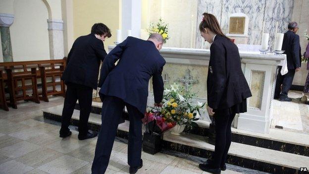 Floral tribute at mass