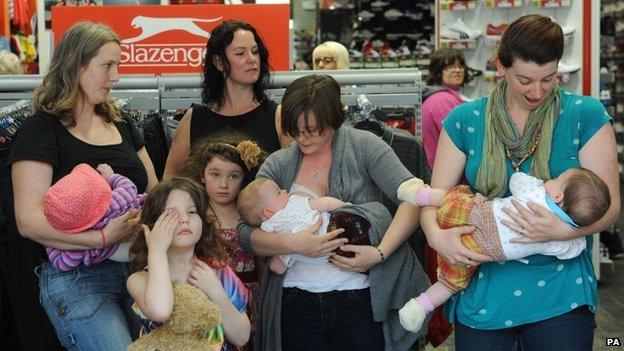 New mothers Lindsay Billsborrow, Ruth Knowles, Catherine Didit and Laura Armitage breastfeed their babies in Sports Direct