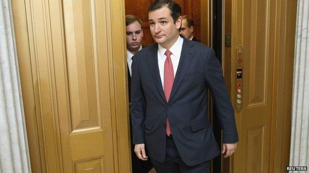 US Senator Ted Cruz walks to the Senate floor for a vote 16 January 2014