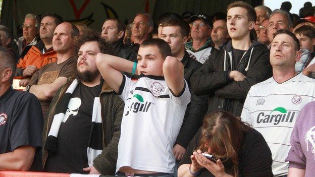 Hereford United fans at Aldershot on the final day of the 2013-14 season