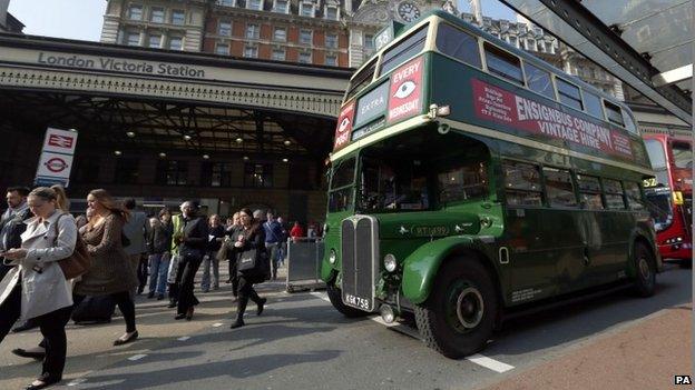 A Routemaster bus outside Victoria station