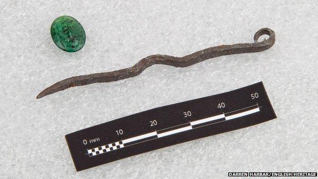 Roman pin from Wroxeter and a glass seal from Kirby Hall