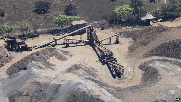 This March 12, 2014 photo shows a confiscated iron ore mining operation near the Pacific port of Lazaro Cardenas