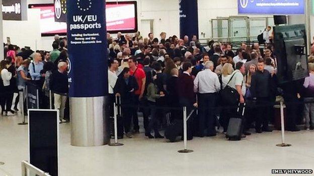 Queuing passengers at Gatwick Airport