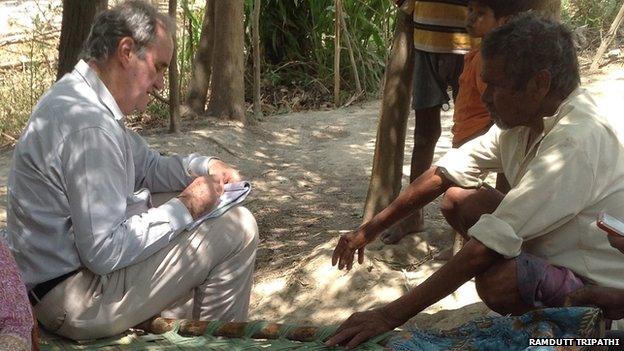 Mark Tully speaks to a villager in Uttar Pradesh