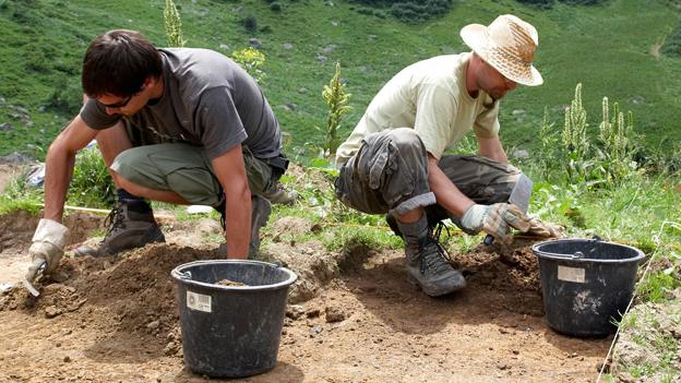 Archaeologists digging on a site in Germany