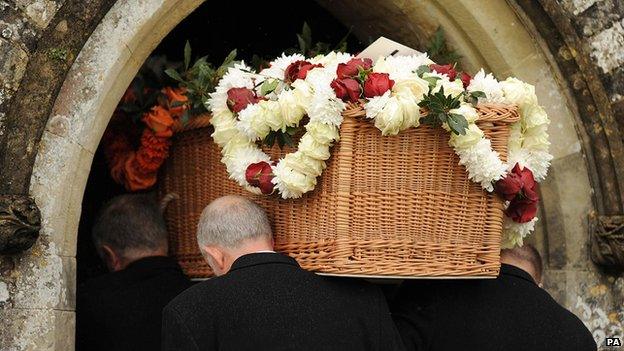 Coffin of Mark Shard is carried into Holy Trinity Church in Stourpaine, Dorset, ahead of his funeral on 1 May 2014