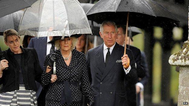 Prince of Wales, Duchess of Cornwall and her daughter Laura Lopes arrive for the funeral of Mark Shand at Holy Trinity Church in Stourpaine, Dorset, 1 May 2014.