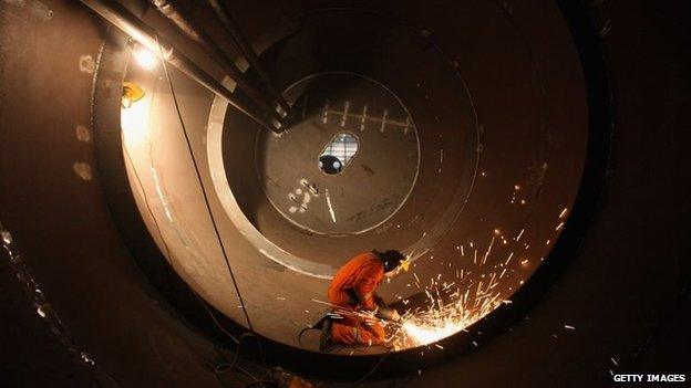 Engineer in a wave power factory