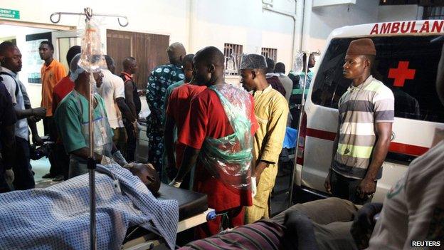 People who were injured are on stretchers at Asokoro general hospital in Abuja on 1 May 2014