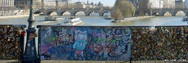 Love locks fixed on the Pont des Arts in Paris