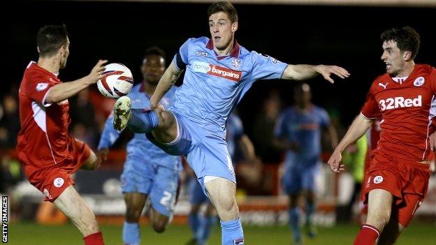 Cole Stockton of Tranmere (centre)