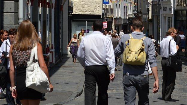 People walking in Guernsey's St Peter Port High Street