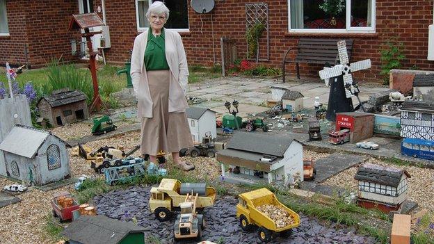 Pat Bullman in her miniature village