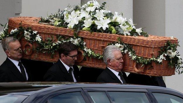 Sue Townsend's casket carried out of the theatre