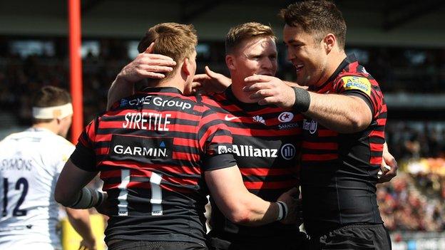 Chris Ashton and David Strettle celebrate Saracens' opening try