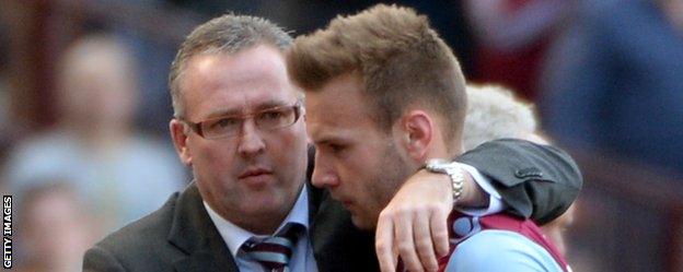 Aston Villa manager Paul Lambert with forward Andreas Weimann