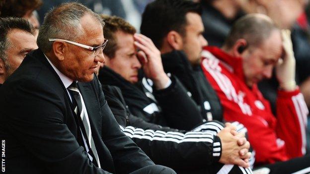 Fulham manager Felix Magath (left)