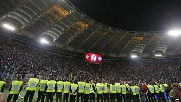 Fans wait for the start of the Italian football cup final, 3 May 2014