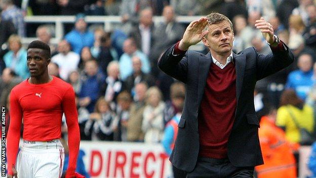 Ole Gunnar Solskjaer applauds Cardiff's fans after the 3-0 defeat at Newcastle