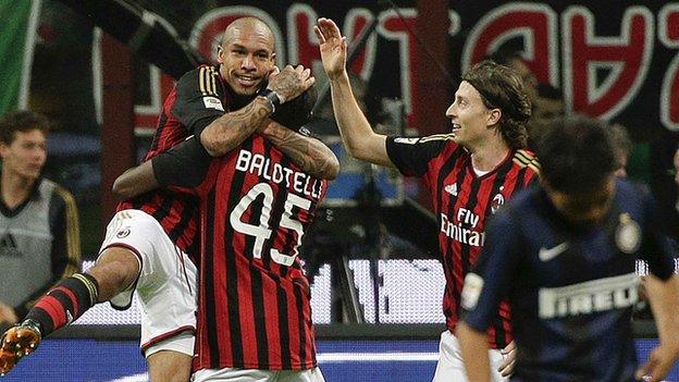 Nigel De Jong celebrates Milan win against Inter