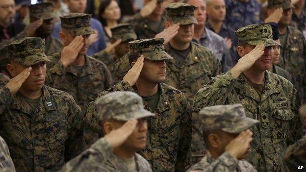 US and Philippine military officers salute during the opening ceremony for the joint military exercise on 5 May in Manila, Philippines