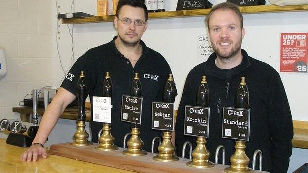 Mark Russell and Simon Dale behind the bar at the Cronx brewery