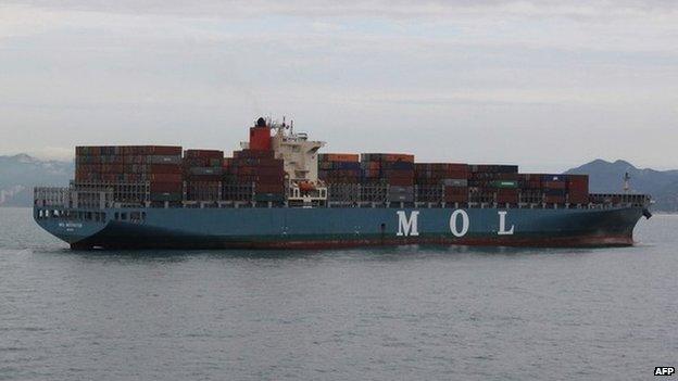 This handout photo taken and received by the Nanhai Rescue Bureau on 5 May 2014 shows the Marshall Islands-registered MOL Motivator floating in the waters off Hong Kong after it collided with a Chinese cargo ship, the Zhong Xing 2