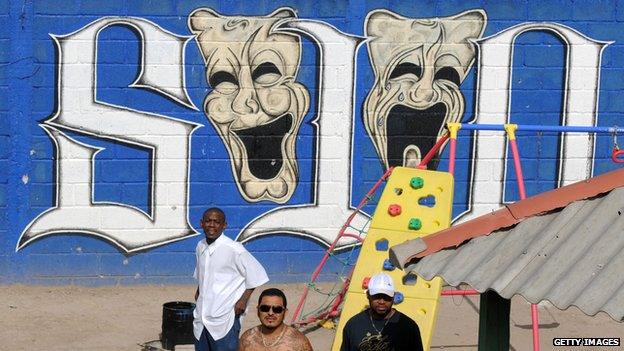 Members of the Mara 18 gang stand in the 'Escorpion' unit, at the Tamara National Penitentiary on 6 August, 2013