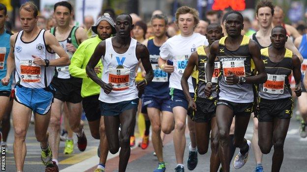 Freddy Sittuk and the only main contenders in the opening moments of the Belfast City Marathon