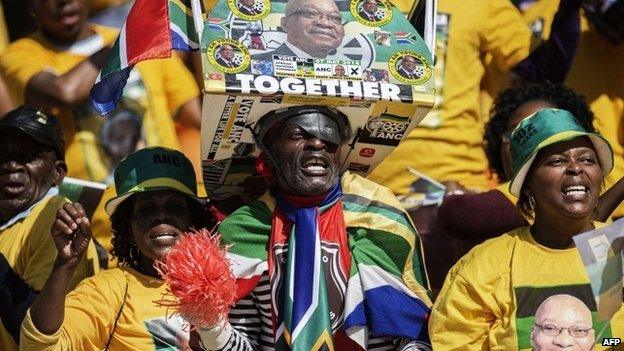 Supporters of South Africa's governing African National Congress wearing shirts with the picture of President Jacob Zuma attend the final ANC election campaign rally at Soccer City stadium in Johannesburg on 4 May 2014