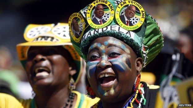 Supporters of South Africa's President Jacob Zuma's African National Congress (ANC) cheer during their party's final election rally in Soweto, on 4 May 2014