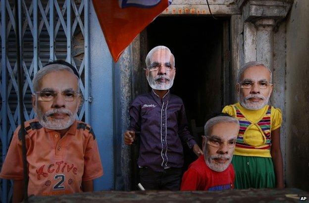 Children wearing Narendra Modi masks in Varanasi