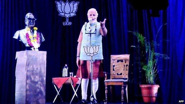 An image of Bharatiya Janata Party prime ministerial candidate Narendra Modi pictured during a live "3D hologram" telecast in Mumbai.