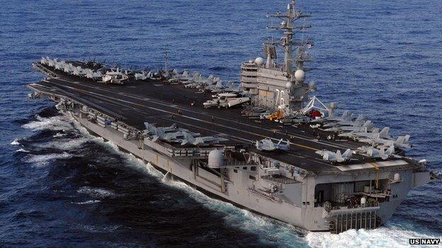 A US Nimitz-class aircraft carrier in the Pacific Ocean