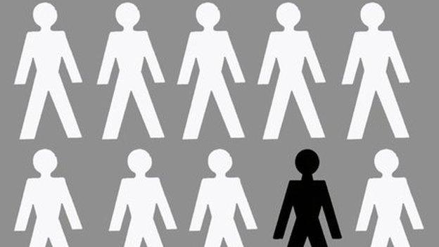 Graphic illustration showing white cut-out stick people figures and black cut-out stick figure person