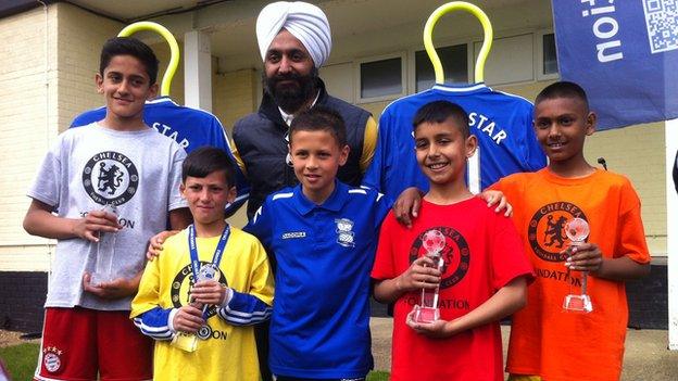 Chelsea Asian Star winners from left - Qasim Khan, Ibrahim Khan, Rayhaan Majid and Kamran Khalid with their trophies and previous winner Sam Khan (front centre)