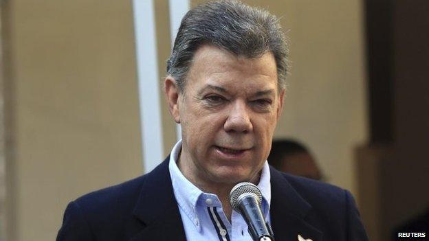 President Juan Manuel Santos speaks to media in Bogota on March 9, 2014.