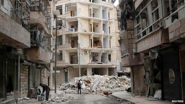 A damaged street in the Al-Shaar neighbourhood of Aleppo, in Syria