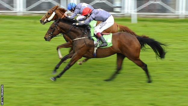 Ryan Moore riding Suegioo (L) wins the Chester Cup from Angel Gabrial