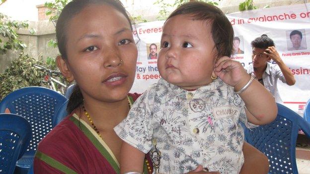 Menuka Magar-Gurung, widow of a Sherpa climber, and son