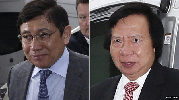 Raymond Kwok (L) and Thomas Kwok arrive at court in Hong Kong. 8 May 2014